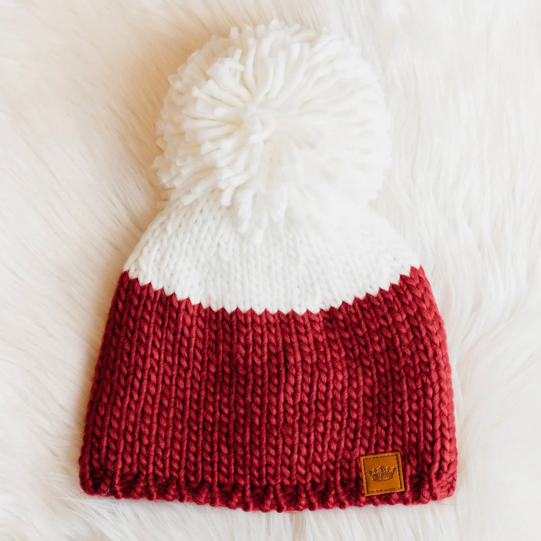 turning red pom hat